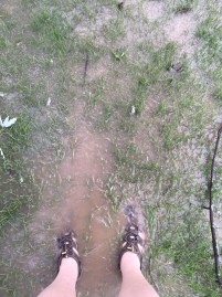 ankle deep in muddy water... this was right outside our yurt so I had no choice but to go through it
